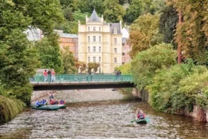 historical-medical-spa-travel-destination-czech-republic-europe-karlovy-vary-september-canoists-tourists-enjoy-tepla-river-45009378